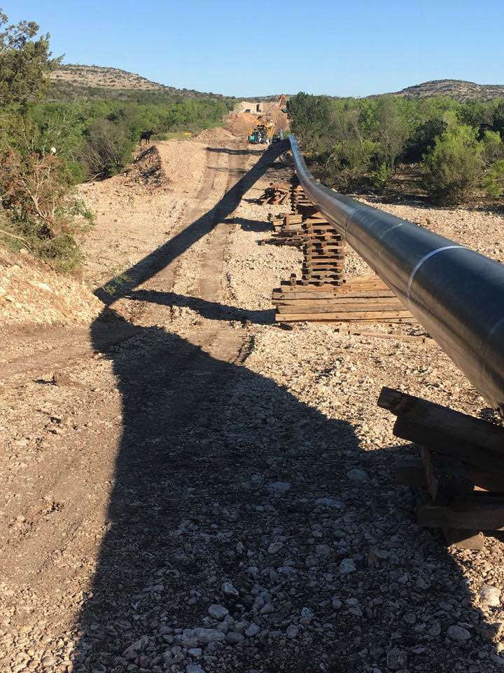 Pipeline construction along a cleared right-of-way corridor